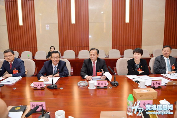 讨论市委常委,黄埔区委广州开发区党工委书记周亚伟代表黄埔区委